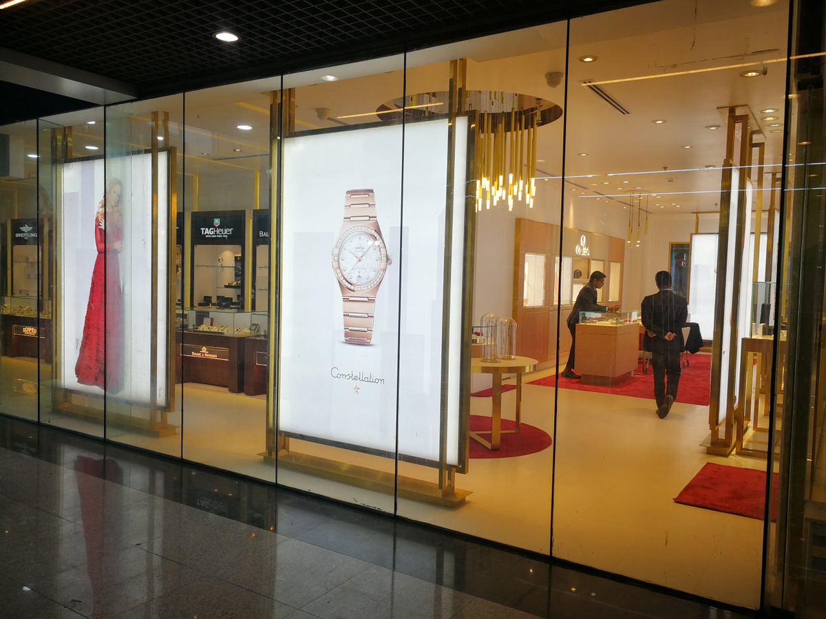 A watch movement being assembled by a watchmaker.
